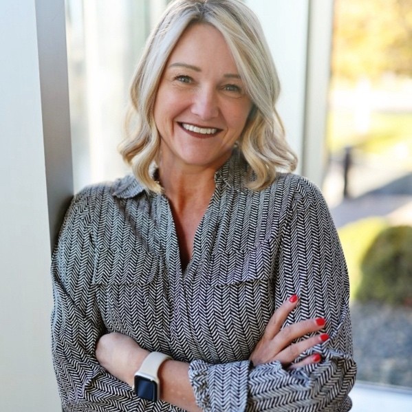 Danielle_DuBois, HR Technology, HR Operations, and Talent Acquisition at American Dairy Queen Corporation seen posing for a photo with a bright smile on her face